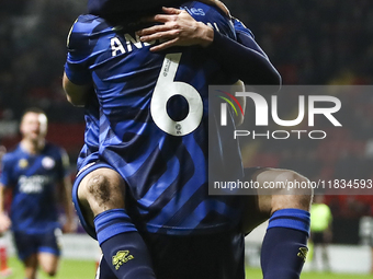 Max Anderson of Crawley Town celebrates his goal with teammate Harry Forster during the Sky Bet League 1 match between Charlton Athletic and...