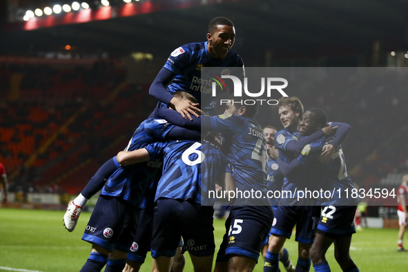 Max Anderson of Crawley Town celebrates his goal with teammates during the Sky Bet League 1 match between Charlton Athletic and Crawley Town...