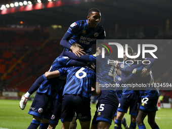 Max Anderson of Crawley Town celebrates his goal with teammates during the Sky Bet League 1 match between Charlton Athletic and Crawley Town...