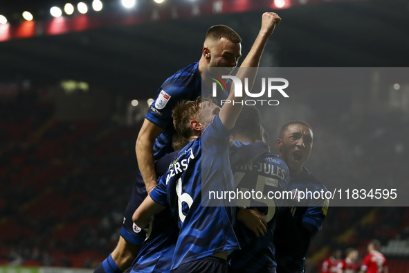 Max Anderson of Crawley Town celebrates his goal with teammates during the Sky Bet League 1 match between Charlton Athletic and Crawley Town...