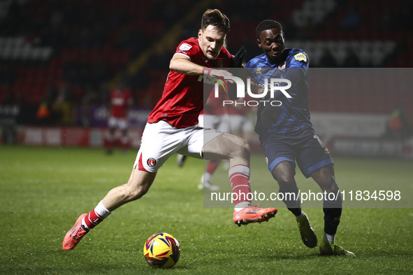 Josh Edwards of Charlton Athletic battles for the ball with Rushian Hepburn-Murphy of Crawley Town during the Sky Bet League 1 match between...