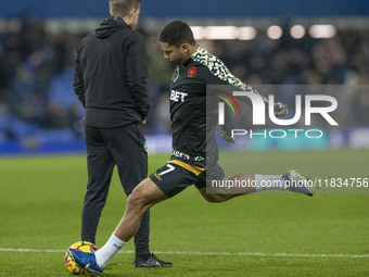 Andre #7 of Wolverhampton Wanderers F.C. warms up during the Premier League match between Everton and Wolverhampton Wanderers at Goodison Pa...