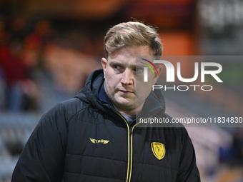 Interim Manager Tom Hounsell observes during the Sky Bet League 1 match between Peterborough United and Burton Albion at the Weston Homes St...