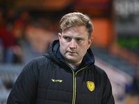 Interim Manager Tom Hounsell observes during the Sky Bet League 1 match between Peterborough United and Burton Albion at the Weston Homes St...