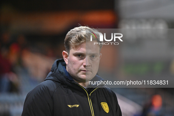 Interim Manager Tom Hounsell observes during the Sky Bet League 1 match between Peterborough United and Burton Albion at the Weston Homes St...