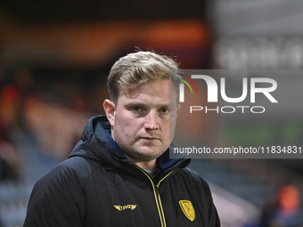 Interim Manager Tom Hounsell observes during the Sky Bet League 1 match between Peterborough United and Burton Albion at the Weston Homes St...