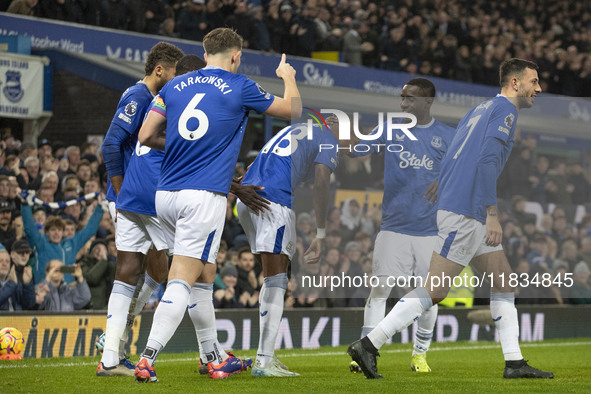 Ashley Young #18 of Everton F.C. celebrates his goal during the Premier League match between Everton and Wolverhampton Wanderers at Goodison...