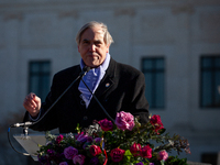 Sen. Jeff Merkley (D-OR) speaks at a demonstration in support of gender-affirming care for transgender children outside the Supreme Court as...