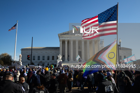 Demonstrations take place outside the Supreme Court as it hears a case on gender-affirming care for transgender children in Washington, DC,...