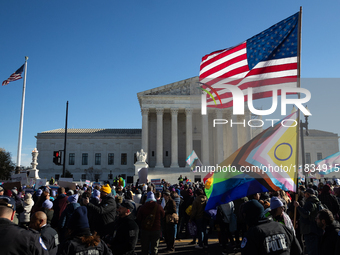 Demonstrations take place outside the Supreme Court as it hears a case on gender-affirming care for transgender children in Washington, DC,...