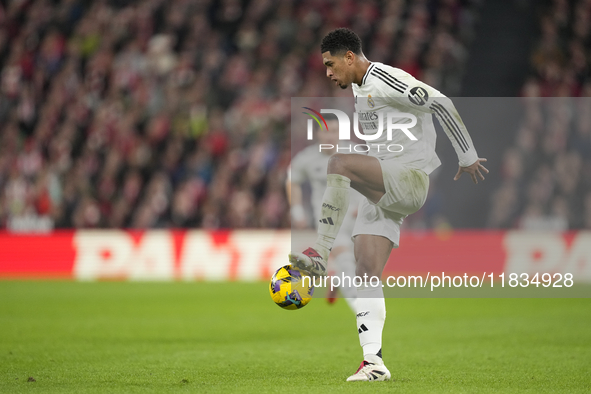 Jude Bellingham central midfield of Real Madrid and England controls the ball during the La Liga match between Athletic Club and Real Madrid...