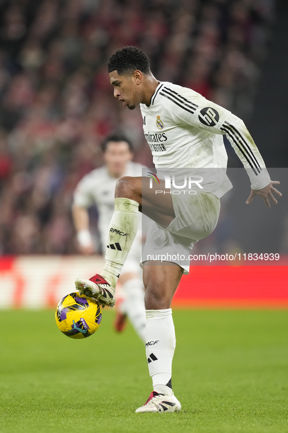 Jude Bellingham central midfield of Real Madrid and England controls the ball during the La Liga match between Athletic Club and Real Madrid...