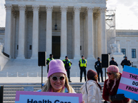 Supporters and opponents of gender-affirming care for transitioning minors are outside the Supreme Court in Washington, D.C., United States,...