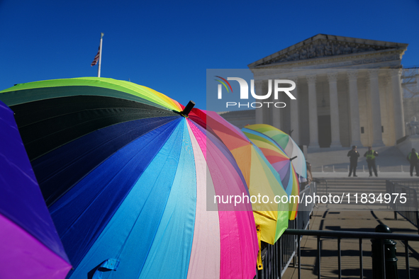 Supporters and opponents of gender-affirming care for transitioning minors are outside the Supreme Court in Washington, D.C., United States,...