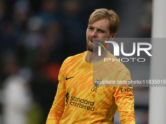 Liverpool goalkeeper Caoimhin Kelleher participates in the Premier League match between Newcastle United and Liverpool at St. James's Park i...