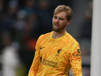 Liverpool goalkeeper Caoimhin Kelleher participates in the Premier League match between Newcastle United and Liverpool at St. James's Park i...