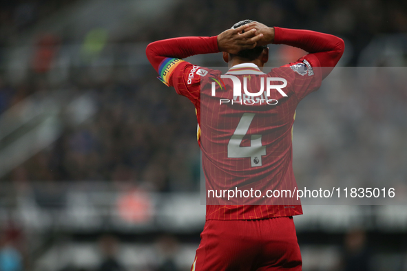 Liverpool's Virgil van Dijk reacts to a mistake during the Premier League match between Newcastle United and Liverpool at St. James's Park i...