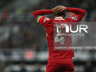 Liverpool's Virgil van Dijk reacts to a mistake during the Premier League match between Newcastle United and Liverpool at St. James's Park i...