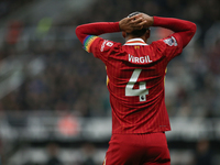 Liverpool's Virgil van Dijk reacts to a mistake during the Premier League match between Newcastle United and Liverpool at St. James's Park i...