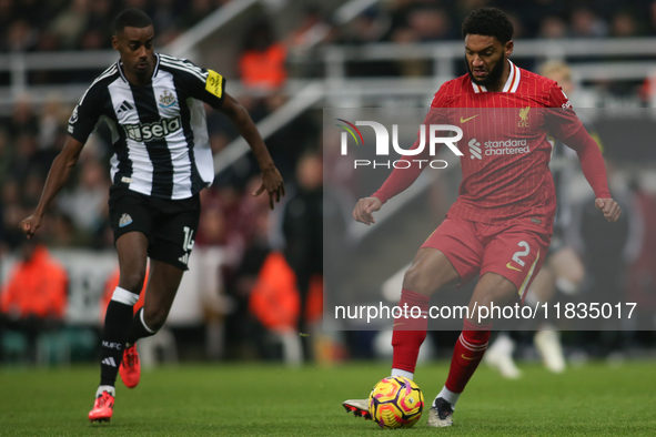 Liverpool's Joe Gomez is under pressure from Newcastle United's Alexander Isak during the Premier League match between Newcastle United and...