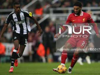 Liverpool's Joe Gomez is under pressure from Newcastle United's Alexander Isak during the Premier League match between Newcastle United and...