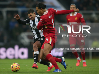 Liverpool's Virgil van Dijk fouls Newcastle United's Bruno Guimaraes during the Premier League match between Newcastle United and Liverpool...