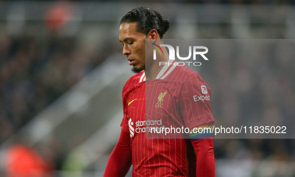 Liverpool's Virgil van Dijk plays during the Premier League match between Newcastle United and Liverpool at St. James's Park in Newcastle, U...