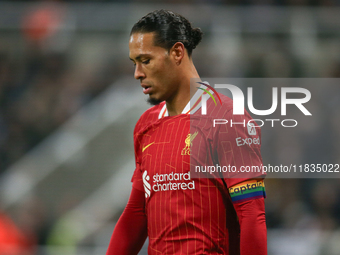 Liverpool's Virgil van Dijk plays during the Premier League match between Newcastle United and Liverpool at St. James's Park in Newcastle, U...