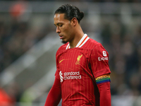 Liverpool's Virgil van Dijk plays during the Premier League match between Newcastle United and Liverpool at St. James's Park in Newcastle, U...