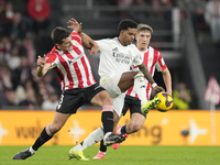 Rodrygo Goes right winger of Real Madrid and Brazil and Dani Vivian centre-back of Athletic Club and Spain compete for the ball during the L...