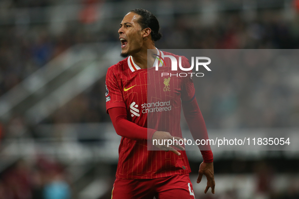 Liverpool's Virgil van Dijk plays during the Premier League match between Newcastle United and Liverpool at St. James's Park in Newcastle, U...