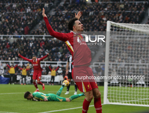 Curtis Jones celebrates Liverpool's first goal during the Premier League match between Newcastle United and Liverpool at St. James's Park in...