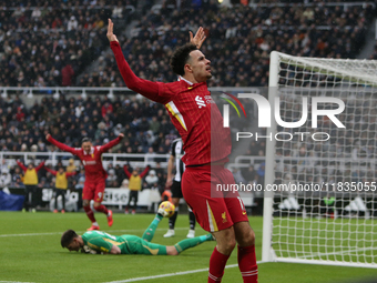 Curtis Jones celebrates Liverpool's first goal during the Premier League match between Newcastle United and Liverpool at St. James's Park in...