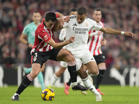 Kylian Mbappe centre-forward of Real Madrid and France and Dani Vivian centre-back of Athletic Club and Spain compete for the ball during th...