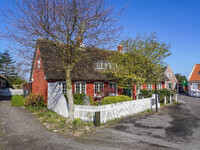 A general view of the traditional Danish houses is seen on the island in Nordby, Fano Island, Denmark, on April 29, 2024. (