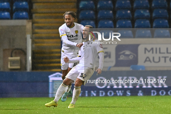 Mason Bennett (32 Burton Albion) celebrates after scoring the team's first goal during the Sky Bet League 1 match between Peterborough Unite...