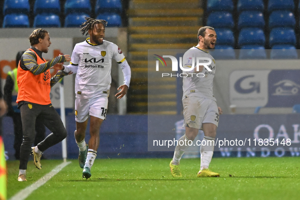 Mason Bennett (32 Burton Albion) celebrates after scoring the team's first goal during the Sky Bet League 1 match between Peterborough Unite...