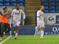 Mason Bennett (32 Burton Albion) celebrates after scoring the team's first goal during the Sky Bet League 1 match between Peterborough Unite...