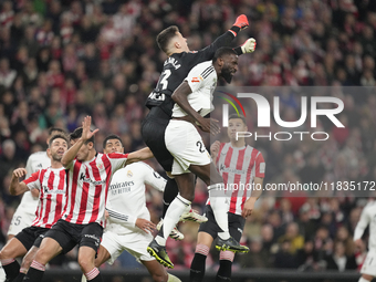 Antonio Rudiger centre-back of Real Madrid and Germany and Julen Agirrezabala goalkeeper of Athletic Club and Spain compete for the ball dur...