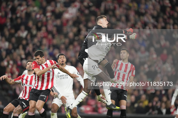 Antonio Rudiger centre-back of Real Madrid and Germany and Julen Agirrezabala goalkeeper of Athletic Club and Spain compete for the ball dur...