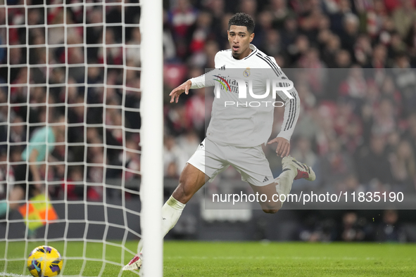 Jude Bellingham central midfield of Real Madrid and England celebrates after scoring his sides first goal during the La Liga match between A...