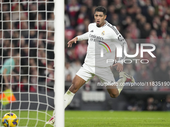 Jude Bellingham central midfield of Real Madrid and England celebrates after scoring his sides first goal during the La Liga match between A...