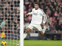 Jude Bellingham central midfield of Real Madrid and England celebrates after scoring his sides first goal during the La Liga match between A...