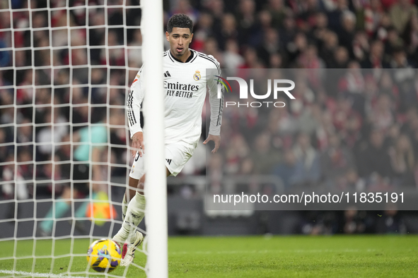 Jude Bellingham central midfield of Real Madrid and England celebrates after scoring his sides first goal during the La Liga match between A...