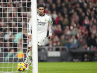 Jude Bellingham central midfield of Real Madrid and England celebrates after scoring his sides first goal during the La Liga match between A...