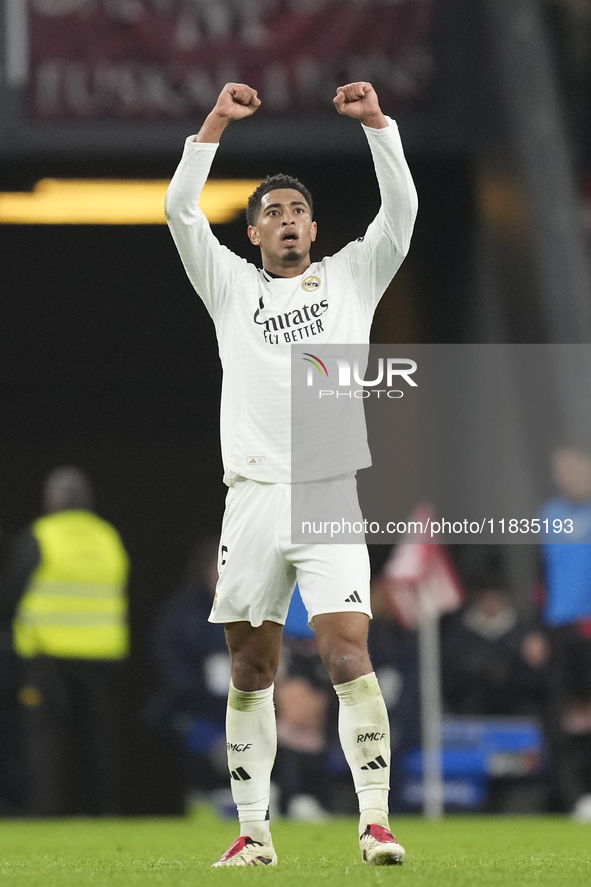 Jude Bellingham central midfield of Real Madrid and England celebrates after scoring his sides first goal during the La Liga match between A...