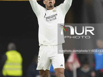 Jude Bellingham central midfield of Real Madrid and England celebrates after scoring his sides first goal during the La Liga match between A...