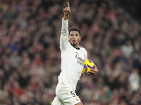 Jude Bellingham central midfield of Real Madrid and England celebrates after scoring his sides first goal during the La Liga match between A...