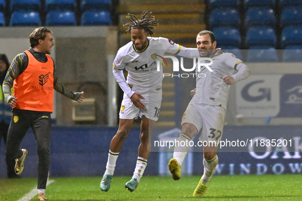 Mason Bennett (32 Burton Albion) celebrates after scoring the team's first goal with Rumarn Burrell (18 Burton Albion) during the Sky Bet Le...