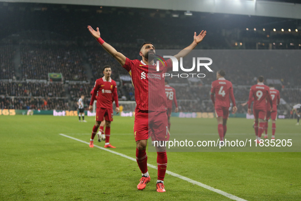 Liverpool's Mohamed Salah celebrates his second goal during the Premier League match between Newcastle United and Liverpool at St. James's P...